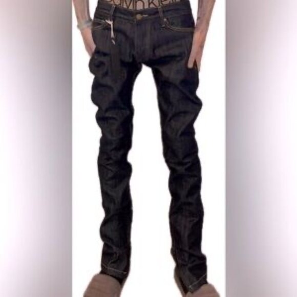 Stylish men's new, unworn (NWT) raw denim jeans from Fear of God, featuring a 30 - Picture 1 of 12